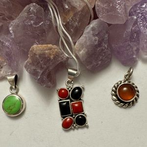 3 charm black onyx and red, green stone and Amber all set in sterling silver